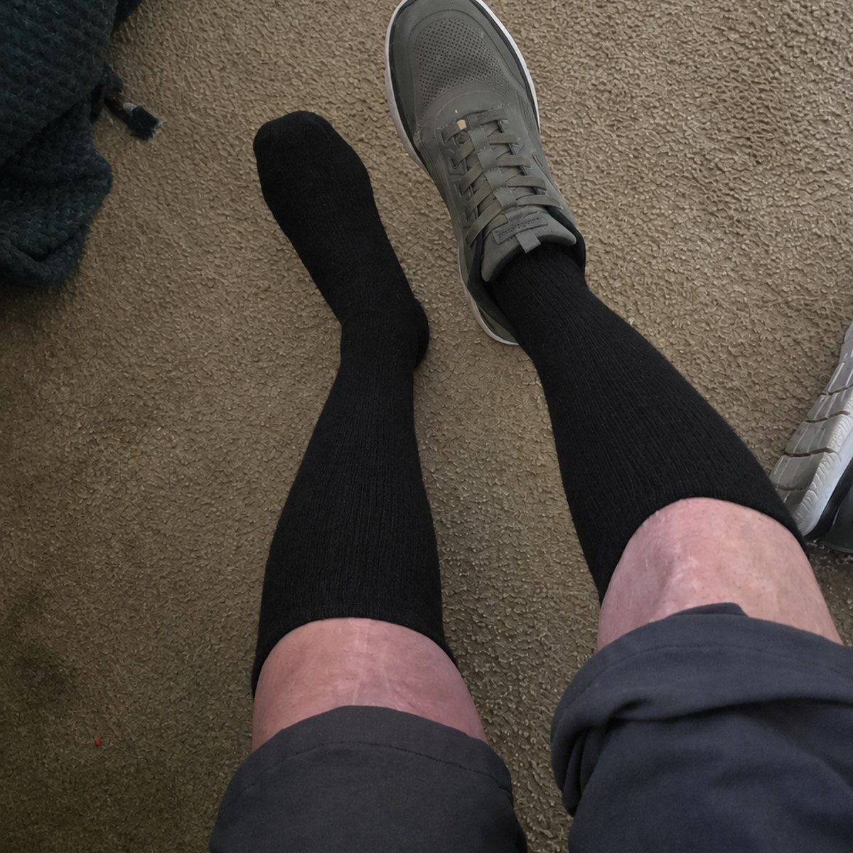 Customer photo from Robert D. — black knee high compression socks worn with trainers